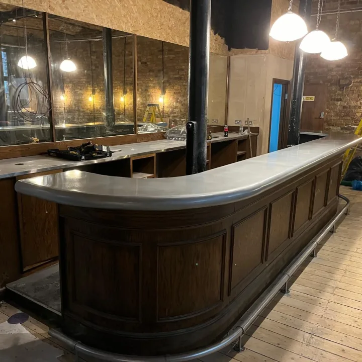 Zinc bar top & footrail