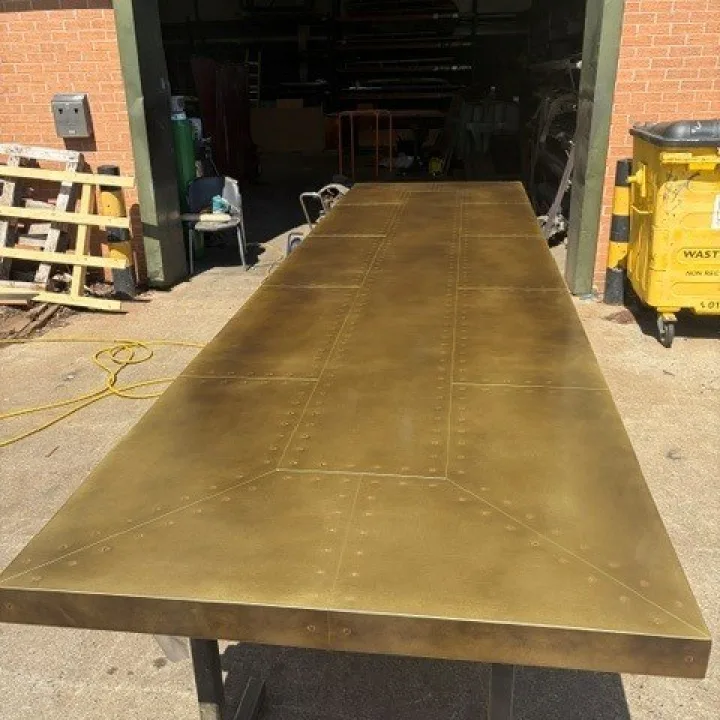 Aged brass table top